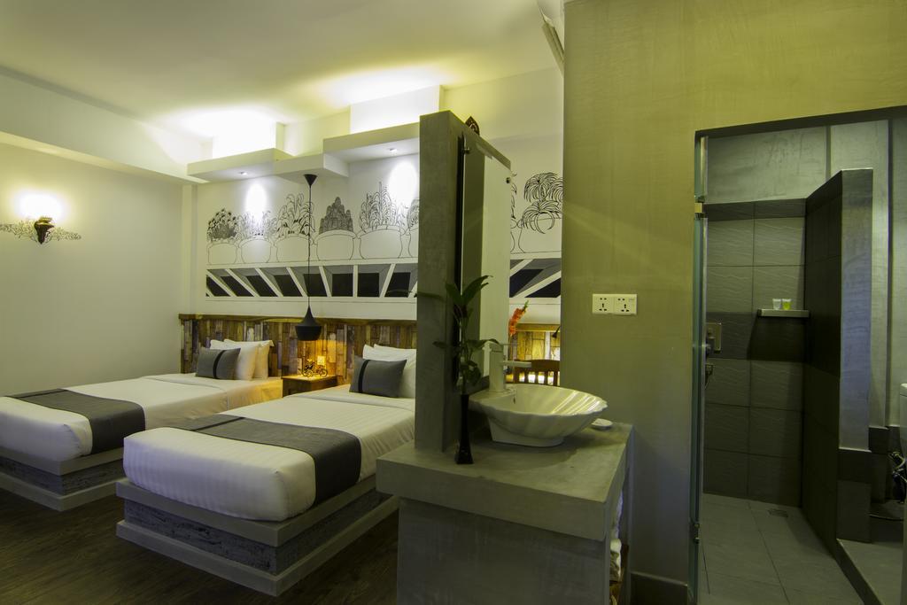 Double Leaf Boutique Hotel Phnompen Szoba fotó